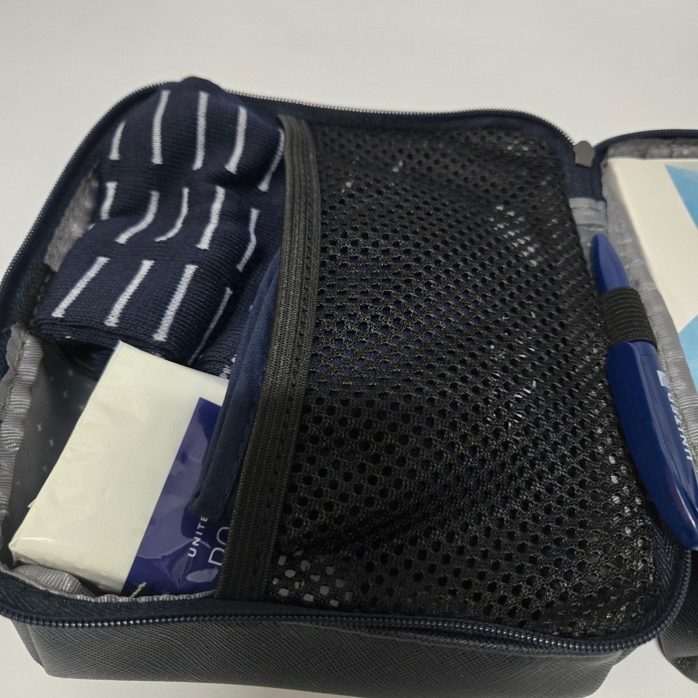 United Polaris Business Class Amenity Kit Sunday Riley Skincare Navy Blue Case